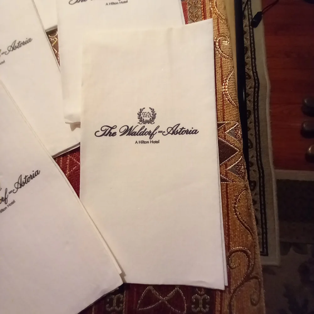 Eight WALDORF ASTORIA serviettes